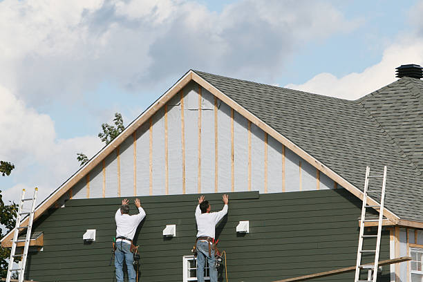 Professional Siding Replacement technician working in Burke, VA